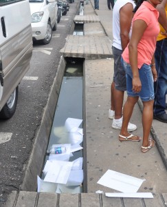 Some of the strewn documents outside of  the GPO’s GRA office on Thursday. 