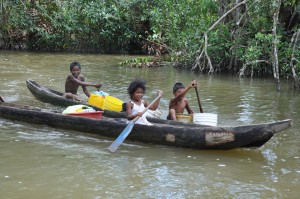 Children of Mabaruma paddle along one of the rivers in the region. 