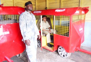 Linmine Security guard, Thomas Pearson, gets a feel of the refurbished scooter, which has the capacity to carry six persons.