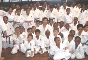 Sensei Yasuaki Nagatomo (centre) posing with local karatekas after grading on May 15, 2010.