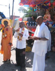 Mayor Hamilton Green, centre, joined participants during the Hare Krishna movement’s Festival of the Chariot, yesterday.