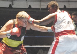 Gwendolyn O'Neil (left) scores to the midsection of Veronica Blackman.