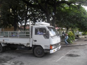 A relieved Manniram drives his Canter truck out of the Brickdam Police Station