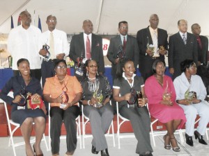 Winners of Awards at the Demerara Mutual Annual General Meeting on Friday pose with Board Members for a group photograph. 