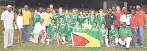 Speaker of the National Assembly Ralph Ramkarran (3rd left), Digicel CEO Gregory Dean (right) are some of the high ranking officials who share this special moment with the Lady Jags following their win over Cuba on Saturday. GFF President Colin Klass (3rd right), MCY&S Parliamentary Secretary Steve Ninvalle (left) and Digicel’s Head of Marketing Jacqueline James (2nd left) are also share the moment. (Franklin Wilson photo)