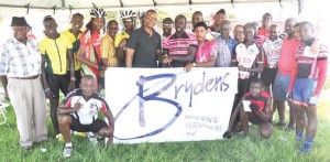 The top performers at the inaugural Bryden & Fernandes / Roraima Bikers Club Cycle Meet pose with race officials and Bryden & Fernandes Marketing Manager Mark Kendall (centre) following the presentation of prizes.  