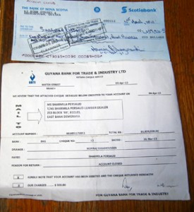 The useless cheque used to pay for lumber and the notice of the disabled bank account