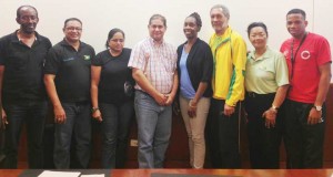 The executive of the Caribbean Badminton Association take time out for a photo following their AGM.