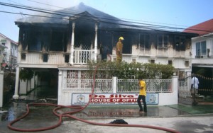 Fire fighters attending to the building.