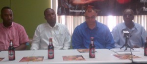 TGH Pacesetters Chairman, Dennis Clarke (right) addresses the media yesterday in the presence of Mackeson Brand Coordinator, Jamaal Douglas (second, left) and other officials of the event at Ansa McAl Headquarters yesterday.