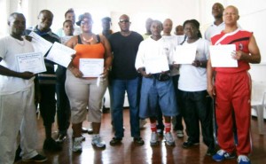 The coaches show off their certificates in the presence of  Steve Ninvalle (4th right), Francisco Roldon Hernandez and  Terrence Poole (extreme right front and back row respectively).