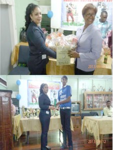 Mrs. Bibi F. Alli, Administrative Assistant, BBCI, handing over a Trophy and two Hampers at Blairmont Centre Cricket Club’s 2nd Awards Ceremony.