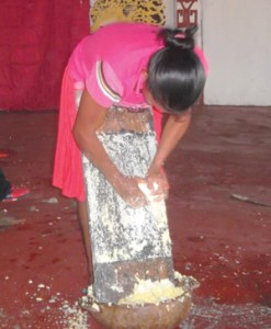 The Cassava Making competition winner Jessie Smith, busy at work