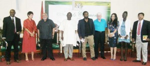 Winners of the Guyana Prize for Literature 2012 alongside the President of Guyana, Donald Ramotar and representatives of the University of Guyana 