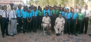 (From left sitting) Maxine Graham and Lyndon Alves flanked by the 27 scouts and their leaders