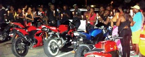 Some of the slain biker’s associates at last night’s vigil.