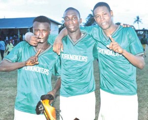 Den Amstel leading marksman Delon Lanferman (centre) poses with fellow goalscorers Dwayne Charles (left) and Jeffrey Perreira yesterday.