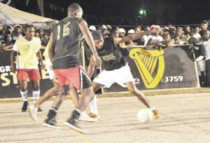 Island All Star (Black bibs) on the attack against Cross Street who they defeated 2-0.