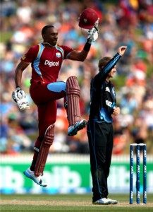 Dwayne Bravo leaps in celebration of his second ODI hundred. (Getty Images)