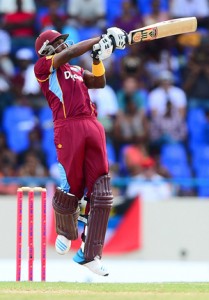 Dwayne Bravo puts all his power into a pull. (AFP)