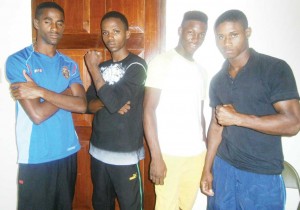 Kestna Davis (2nd right) chalked up Jamaica’s lone win on Saturday night, while from left, Patrick Sahadeo and Anthony Clark lost out on their bouts. Michael Gardner (right) was scheduled for action last night.