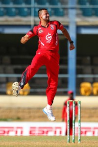  Ryad Emrit celebrates after claiming one of his four victims as Trinidad demolished Jamaica for 49. (Ash Allen photo)
