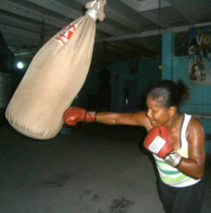Alfred pounds away at the heavy bag during training sessions Monday afternoon last.