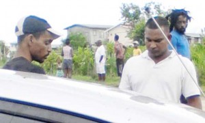  The driver (white shirt) and his occupant 