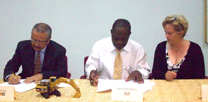 (from left) Jorge Medina, Professor Jacob Opadeyi, and UG Lecturer, Elena Trim during the signing of the MoU
