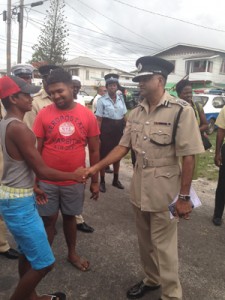  Police Commissioner Seelall Persaud meeting with youths within the Albouystown community yesterday.