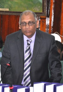 Agriculture Minister Dr Leslie Ramsammy provides answers to the Committee.