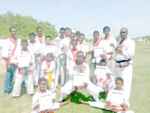 Students of the Little Diamond International Martial Arts Academy take time out for a group photo after the workshop.