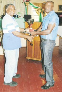 Major James Fraser (right) being honoured by RHTYSC President, Keith Foster