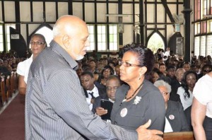 Presdient Ramotar offers words of condolence to Valarie Williams,  the wife of the late Bank of Guyana Governor.