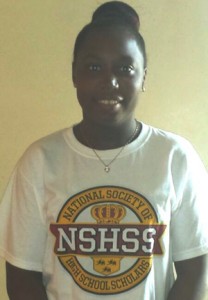 Lakeisha Henry proudly sports an NSHSS T-Shirt