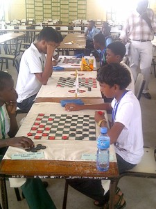 Part of the action in the NCE Thrill sponsored Draughts tournament at Bladen Hall Multi School.