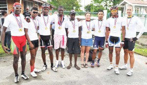 The respective category winners of GCF Time Trials and Road Race display their medals.
