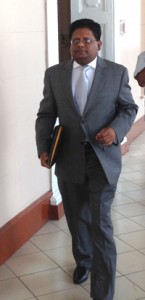 Finance Minister Dr Ashni Singh as he made his way to the chambers in March last to present the 2014 Budget.