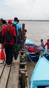 Passengers utilizing the backtrack route prepare to enter the speedboat that will take them to Nickerie, Suriname via the Corentyne River