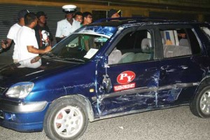 The damaged taxi 