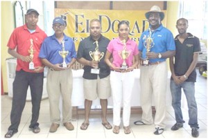 In picture, from right, El Dorado Manager, Larry Wills, Archbishop Philbert London, Joaan Deo, David Mohamad (standing in for Santo), Bhowlaram Deo, and Naro (for Santo) at the presentation.