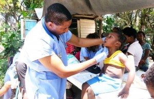  A doctor examining a child 