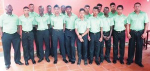 Members of the national U-17 team with Coach Garvin Nedd (far left) and manager Nazeer Mohamed (extreme right) just before they departed the Windjammer Hotel. 