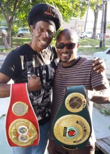 Champions Meet! Guyanese International Superstar Eddy Grant shares a special moment with fellow Guyanese and former World boxing champion, Gary St. Clair.