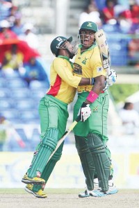  Denesh Ramdin hugs Christopher Barnwell after he hit the winning runs, a straight six. (CPL T20 Ltd.2014)