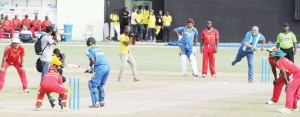 President Ramotar bowls the first  ball to Sewnarine Chattergoon.