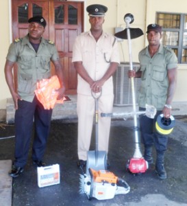 Representatives of the Guyana Prison Service pose with some of the equipment they received from the “Clean-Up My Country” committee.