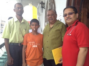Patrick Finlayson (Supervisor at Hope Children’s Home on the left), Sanjay Bismah, President of Guyana Watch Tony Yassin and Dr. Partha Chatergee (right)