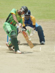 Tagenarine Chanderpaul drives during his hundred yesterday.