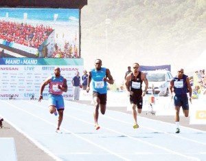 Usain Bolt (2nd left) powers through to win the race in Brazil. (Usain Bolt FB)